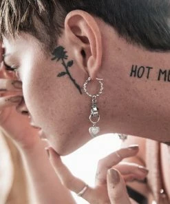 CLASSICS ALL OF ME. Hand Grasping Heart Single Earring - Gold Earrings