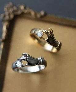 CLASSICS MILDRED. Disembodied Hand Gold Ring Rings